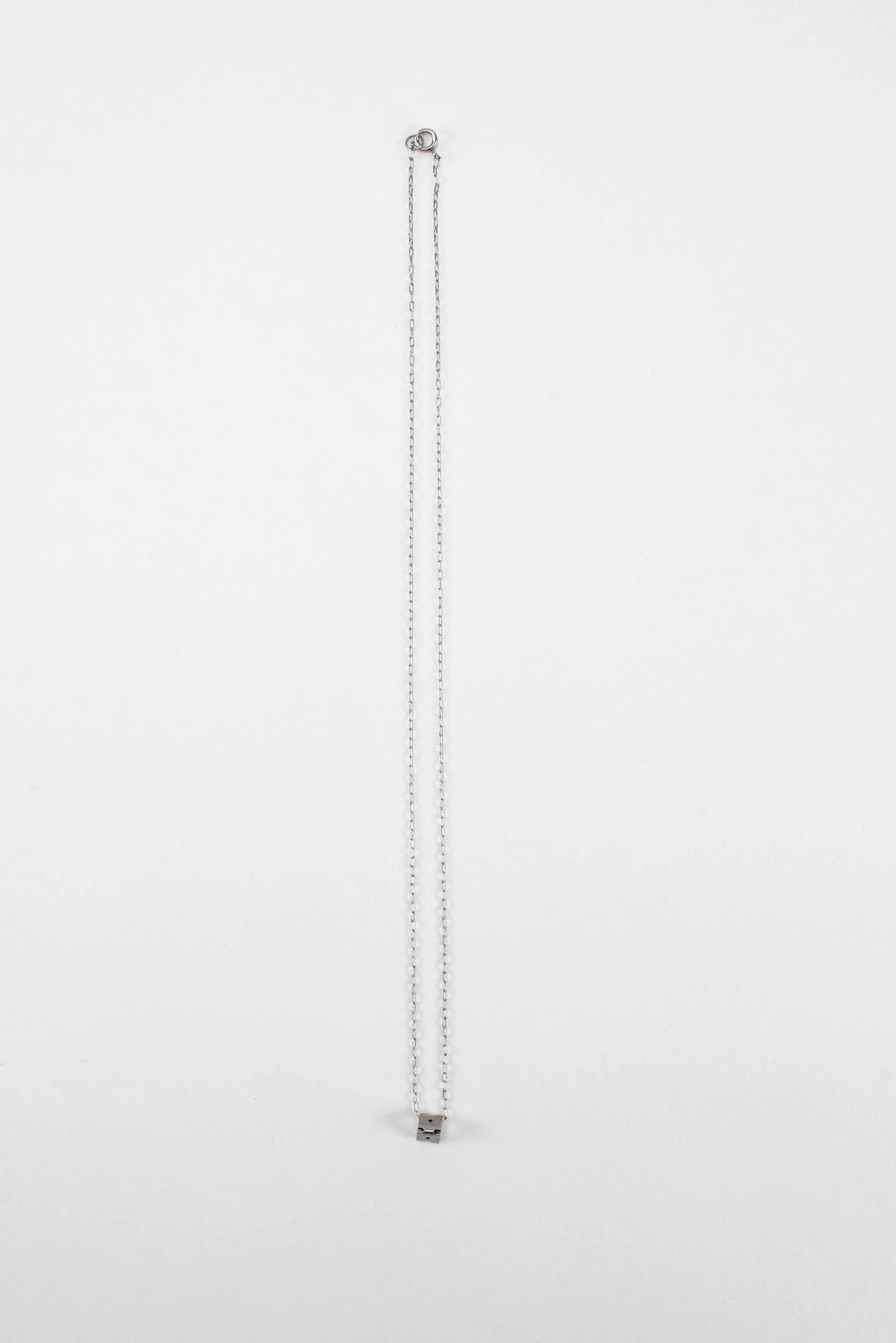 Pixel Pendant - small triangle — image 1 of 4