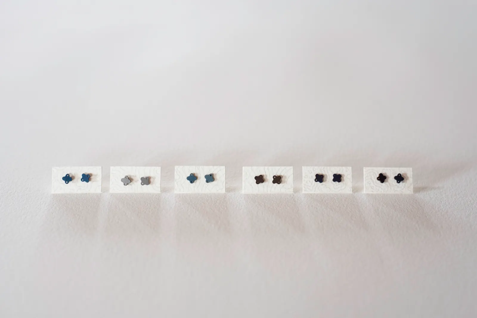 Quatrefoil studs